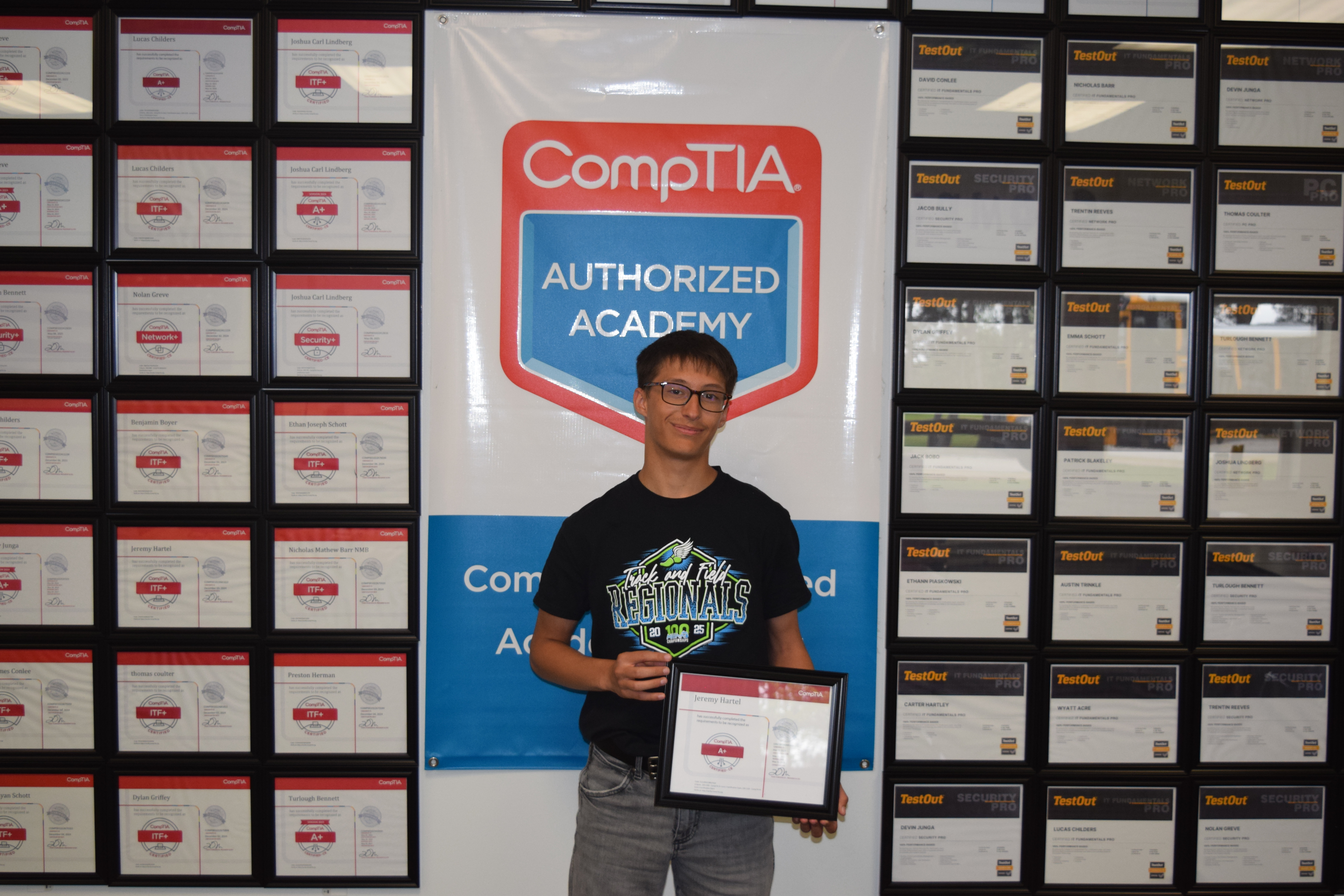 Cros-Lex student holding two certifications